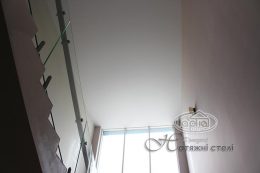 натяжна стеля в коридорі, клубі Версаль