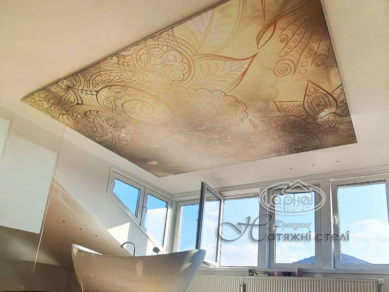 натяжні стелі в мансарді
